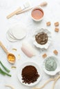 Natural herbal skin care products, top view ingredients coffee scrub and beans, aloe vera, clay, honey on table concept natural