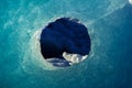 Natural hole in an iceberg