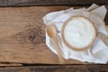 Natural homemade plain organic yogurt mixed with fresh berry fruit white bowl and wood spoon on wood texture background Royalty Free Stock Photo