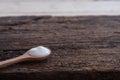 Natural homemade plain organic yogurt in wooden bowl and wood spoon on wood texture background Royalty Free Stock Photo