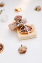 Natural homemade soap bars and flowers on white background. Spa concept, body care products. Holiday gift, top view flat lay Royalty Free Stock Photo