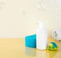 Natural Hypoallergenic Foam for bathing children. White Plastic pump bottle. children's cosmetics. Bottles, towel and