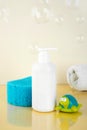 Natural Hypoallergenic Foam for bathing children. White Plastic pump bottle. children's cosmetics. Bottles, towel and