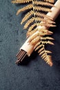 Natural incense sticks and a fern leaf