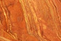Natural Italian lava-colored stone with stripes called Travertin Rosso