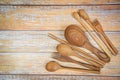Natural kitchen tools wood products / Kitchen utensils background with spoon fork chopsticks ladle and dessert spoon various sizes Royalty Free Stock Photo