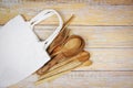 Natural kitchen tools wood products / Kitchen utensils background with spoon fork chopsticks plate cutting board object and cloth Royalty Free Stock Photo