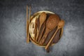 Natural kitchen tools wood products / Kitchen utensils background with spoon fork chopsticks plate cutting board object , top view Royalty Free Stock Photo