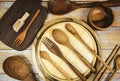 Natural kitchen tools wood products / Kitchen utensils background with spoon fork chopsticks bowl plate cutting board object , top Royalty Free Stock Photo