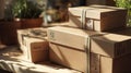 Natural Kraft Boxes Stacked in Warm Sunlight Ready for Shipping Orders Placed Royalty Free Stock Photo
