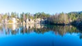 Natural lake in Adrspach rocks on sunny autumn day. Adrspach-Teplice sandstone rock town, Czech Republic