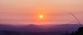 Natural landscape background of sunrising over mountains with orange sky Royalty Free Stock Photo