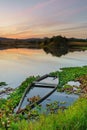 Natural landscape with boats in the water at sunset. Amazing lake with small artisanal fishing boats Royalty Free Stock Photo