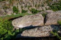 Natural landscape of the canyon with granite rocks layers of flat stones. Royalty Free Stock Photo