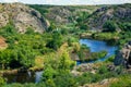 Natural landscape of canyon with granite rocks on the top of the cliff. Royalty Free Stock Photo