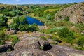 Natural landscape of the canyon with granite rocks on the top of the cliff. Royalty Free Stock Photo