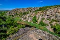 Natural landscape of a canyon with granite rocks on the top of a mountain. Royalty Free Stock Photo