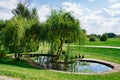natural landscape on the golf course. artificial pond. Landscaping.