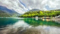 Natural landscape. Panorama view of the lake Small Ritsa. Trees reflecting in the blue from lapis lazuli water. Ritsa National Par Royalty Free Stock Photo