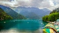 Natural landscape. Panorama view of the lake Small Ritsa. Trees reflecting in the blue from lapis lazuli water. Ritsa National Par Royalty Free Stock Photo