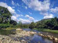 Natural landscape with river and clouds. Paisaje natural con rÃÂ­o y nubes Royalty Free Stock Photo