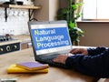 Natural-language processing NLP is shown on the photo using the text
