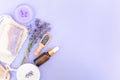 Natural lavender beaty self-care products for body and skin care over purple background with copy space Royalty Free Stock Photo