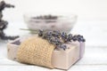 Natural lavender soap with lavender flowers on it Royalty Free Stock Photo