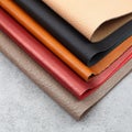 Natural leather textures samples on gray stone background Royalty Free Stock Photo