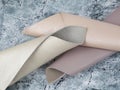 Natural leather textures samples on grey stone background Royalty Free Stock Photo