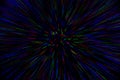 Natural lens zoom explosion radial blurred red green blue dots on black background