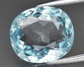 natural light blue aquamarine beryl gem on the background Royalty Free Stock Photo