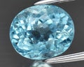 natural light blue aquamarine beryl gem on the background Royalty Free Stock Photo