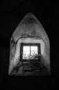 Natural light enters in an abandoned building and ruins in black and white Royalty Free Stock Photo