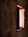 Natural light ing and shadows inside buddhism temple building window Royalty Free Stock Photo
