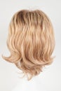 Natural looking blonde fair wig on white mannequin head