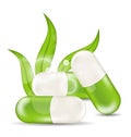 Natural medical pills with green leaves