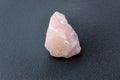 Natural mineral crystal of rose quartz gemstone. Natural rose quartz crystal Royalty Free Stock Photo