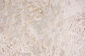 Natural mineral limestone blurred white background. Pamukkale travertine pools surface texture, Turkey Royalty Free Stock Photo