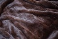 Natural mink fur brown. Texture, background. Natural brown mink coat close up, short nap Royalty Free Stock Photo