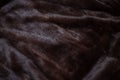 Natural mink fur brown. Texture, background. Natural brown mink coat close up, short nap Royalty Free Stock Photo