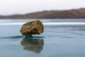 Natural miracle stoune stand on an ice stark