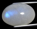 natural moonstone adular gem on the background Royalty Free Stock Photo