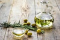 Natural oils concept with fresh olives on table background mock up