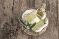 Natural olive oil soap bars and olive oil bottle in a basket Royalty Free Stock Photo