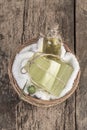 Natural olive oil soap bars and olive oil bottle in a basket Royalty Free Stock Photo