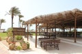 Natural open restaurant on the sea shore