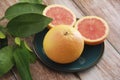 Natural orange fruit greupfruit on a plate Royalty Free Stock Photo