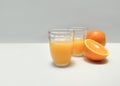 Natural orange juice accompanied by fresh frui