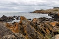 The natural orange rock formations along the coastline in Penneshaw Kangaroo Island South Australia on May 12th 2021